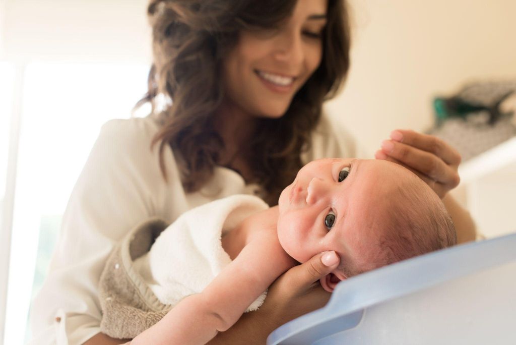 Expectant mother attending antenatal care with healthcare provider to ensure a healthy and successful vaginal birth.