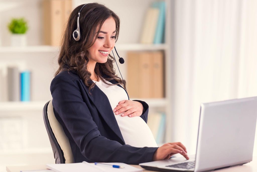 A mum-to-be organising her antenatal care schedule at work.